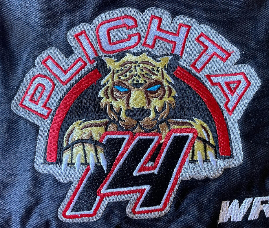 Haft Plichta 14 na ocieplaczu do kół motoru